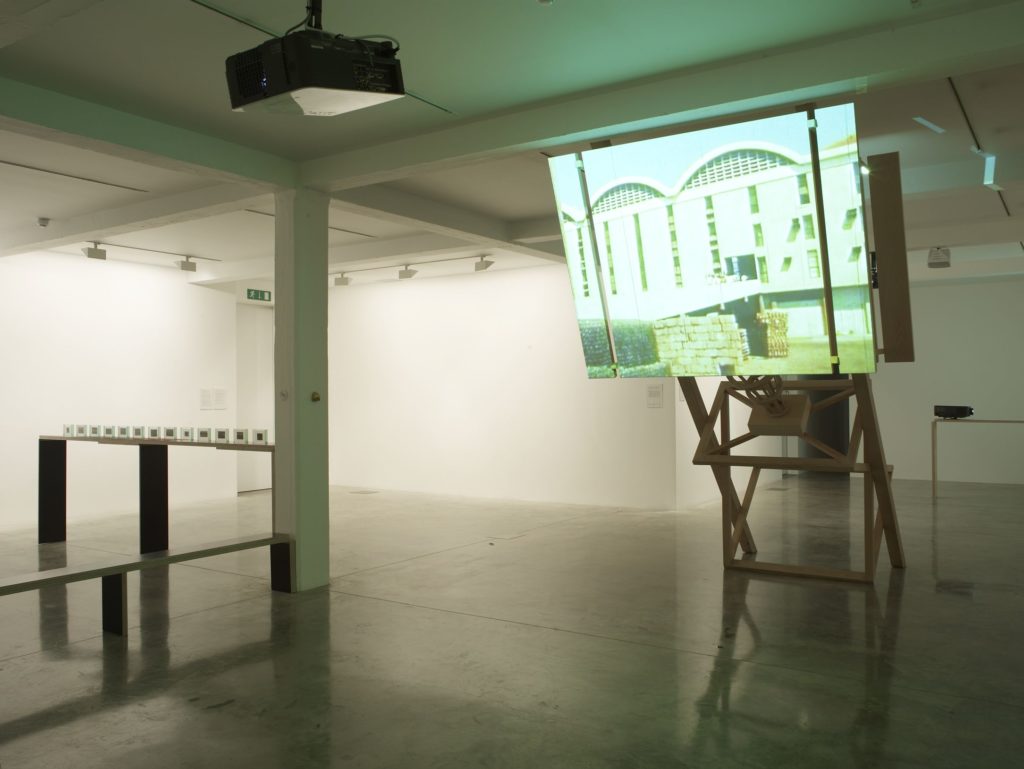Ângela Ferreira, For Mozambique (Model N.2 for a screen-orator-kiosk celebrating the post-independence utopia), 2008 (right), and Narelle Jubelin and Marcos Corrales, Ungrammatical Landscape 2, 2003-2008 (left), installation view at Parasol unit, London, 2008. Photography by Stephen White

