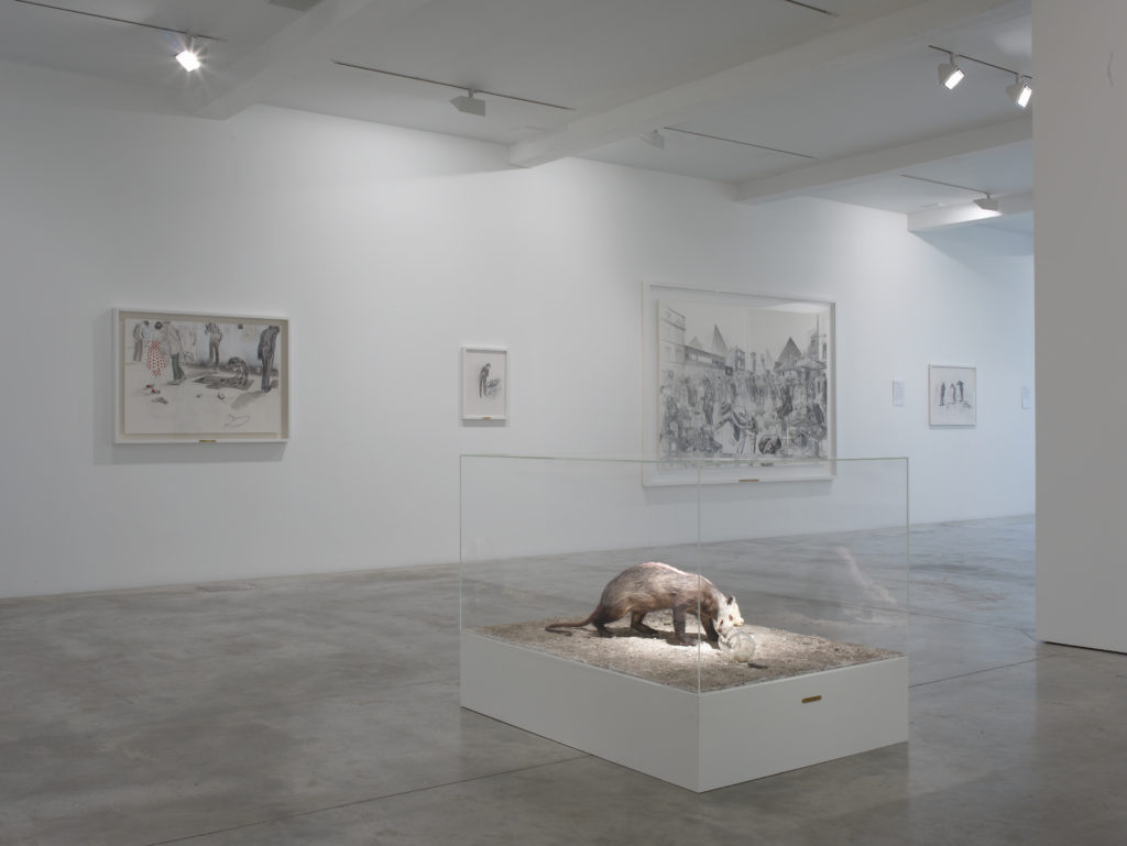 Charles Avery, King in Exile, 2008 (front), Untitled (Stone-mouse Sellers), 2008 (left), installation view at Parasol unit, London, 2008. Photography by Stephen White
