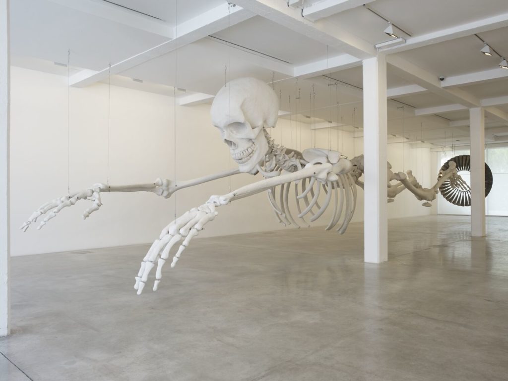 Adel Abdessemed, Habibi, 2003. Resin, fibreglass, polystyrene, aeroplane engine turbine; length including engine turbine: 21 m. Installation view at Parasol unit, London, 2010. Photography by Stephen White. Collection of Mamco, Genève, acquired thanks to BFAS, Blondeau Fine Art
