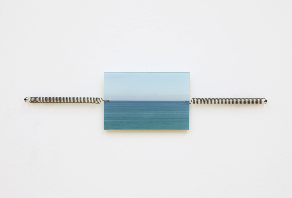 Jorge Macchi, Horizonte, 1995, photograph, glass, springs and nails, 12.5 x 44 x 2 cm. Courtesy the artist and Galerie Peter Kilchmann, Zurich. Photo: Stephen White
