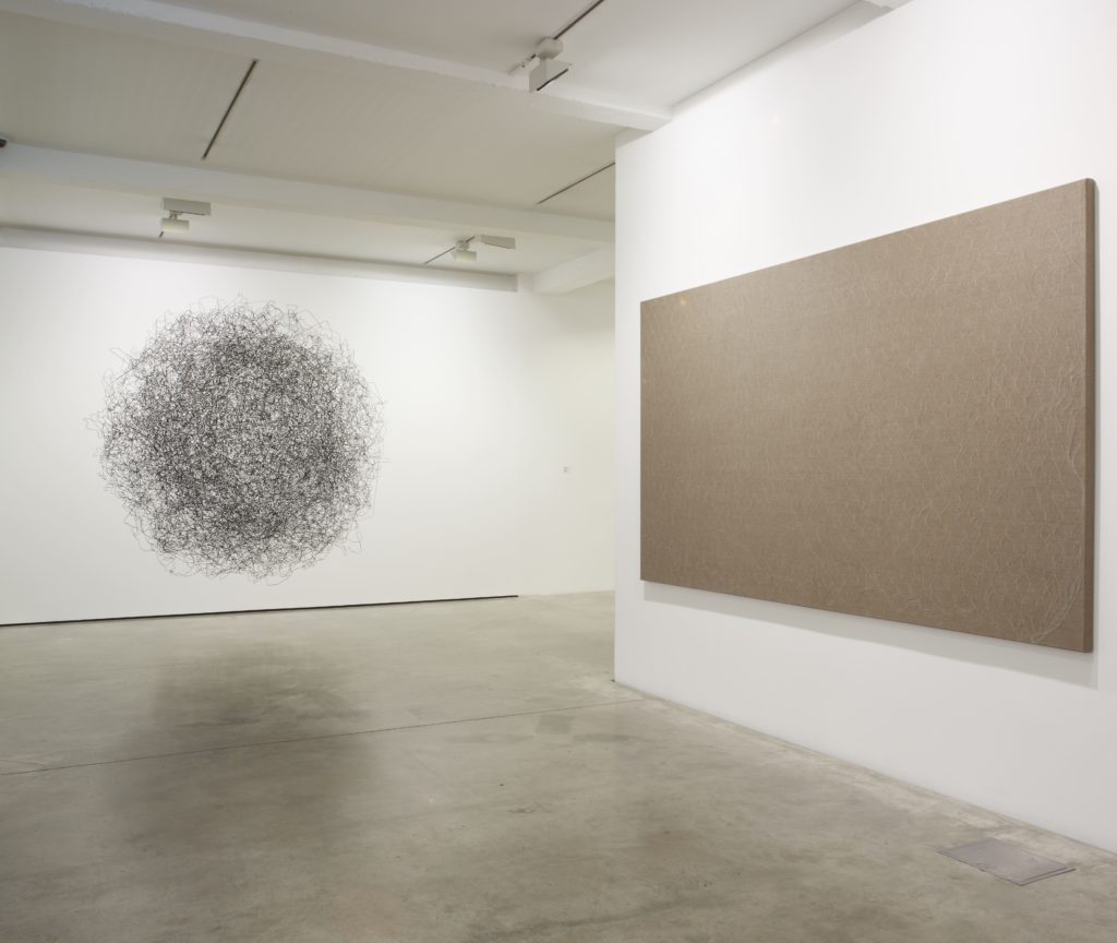Özlem Günyol and Mustafa Kunt, Ceaseless Doodle, 2009, and Helene Appel, Large Nylon Net, 2011, installation view at Lines of Thought, Parasol unit, London, 2012. Photography by Stephen White
