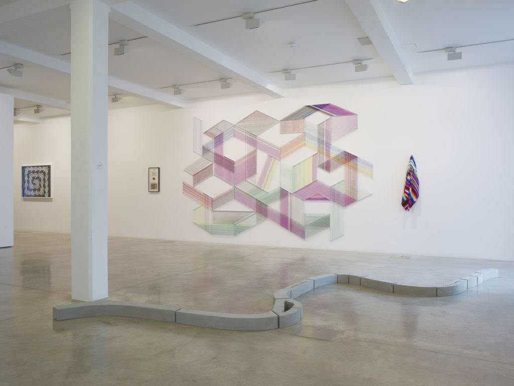 Adrian Esparza, Now and Then, 2010 (centre), installation view at Parasol unit, London, 2012. Photography by Stephen White
