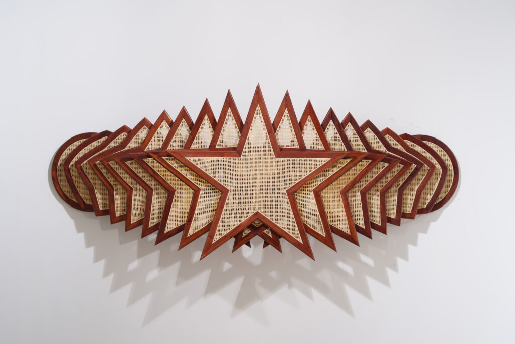 Horizontally layered stars made from rattan and wood